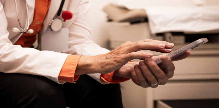 A locums physician uses the digital portal on their phone.